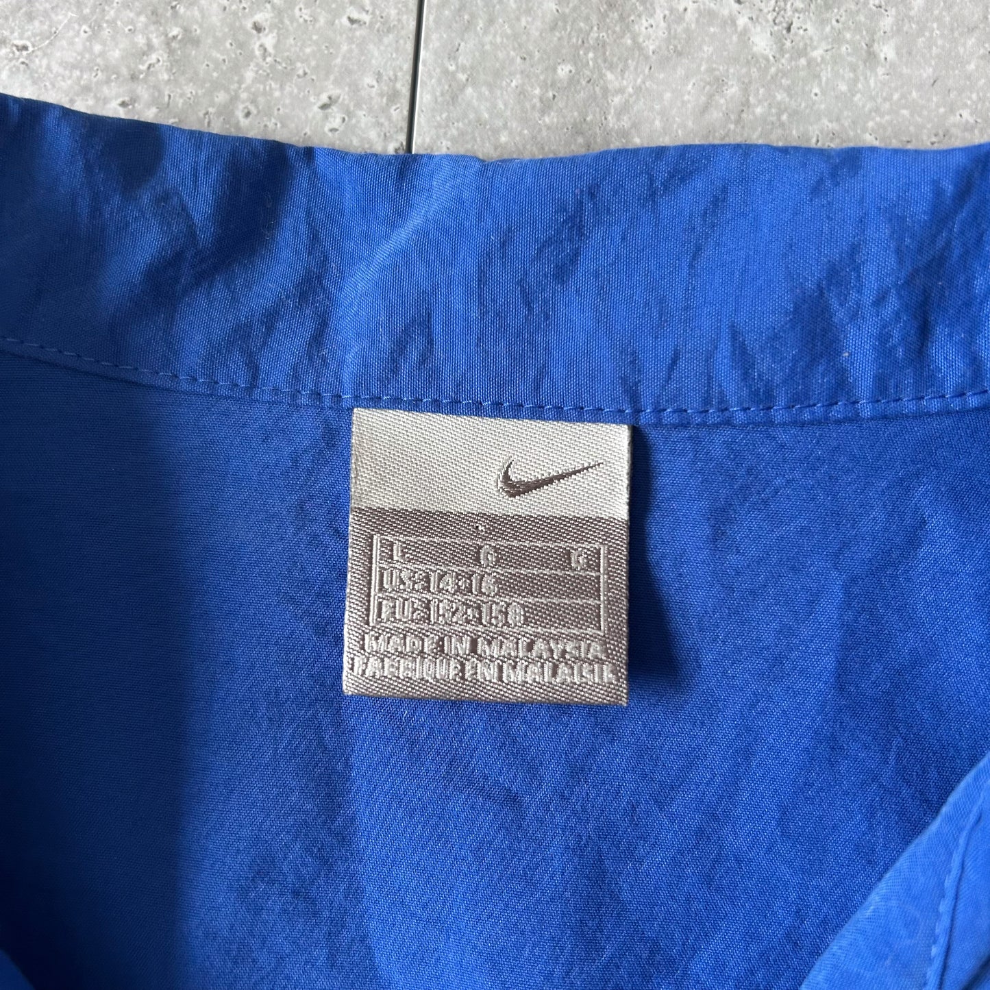 vintage y2k Nike Blue Button-Up Shirt with Graphic Hem