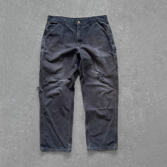 1990s - vintage faded navy worn carhartt carpenter trousers