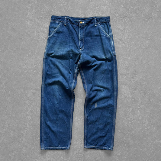 1990s - vintage dark wash carhartt denim carpenter trousers