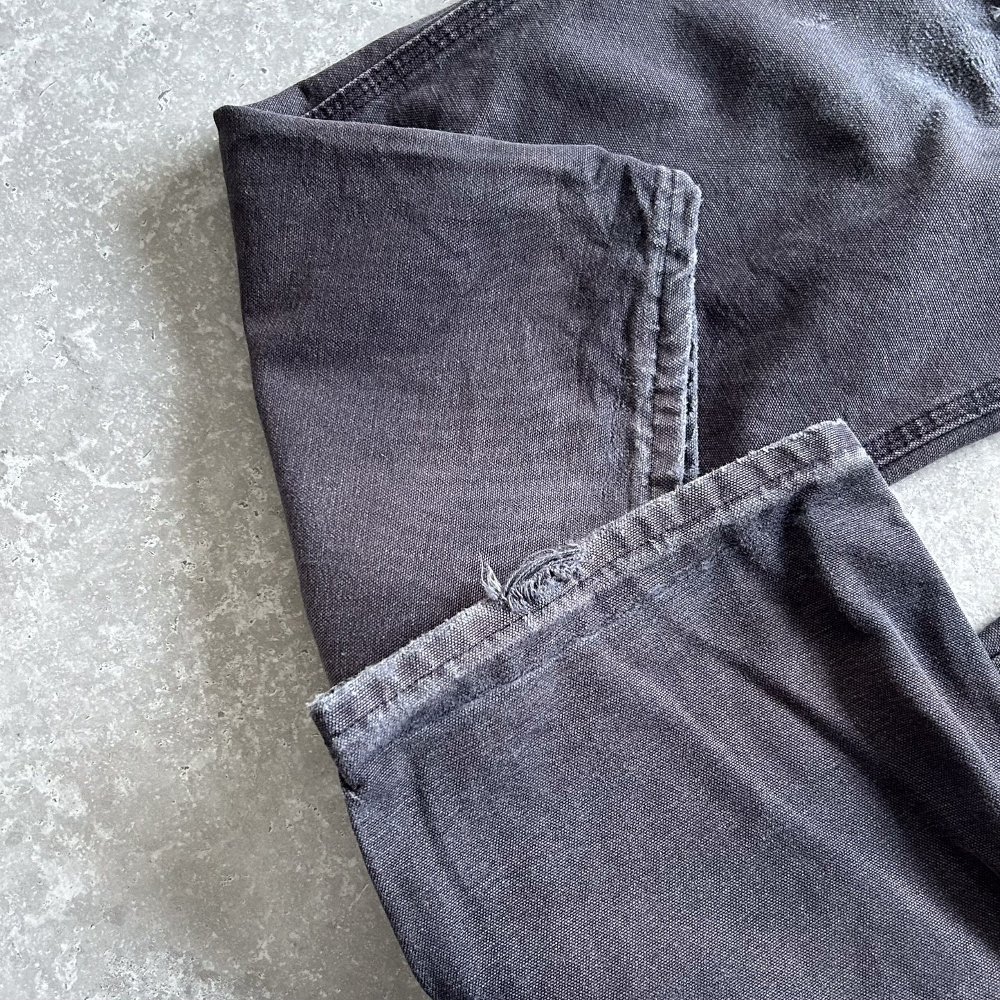 1990s - vintage faded navy worn carhartt carpenter trousers