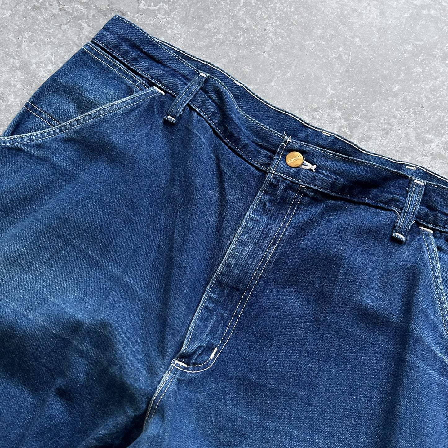 1990s - vintage dark wash carhartt denim carpenter trousers