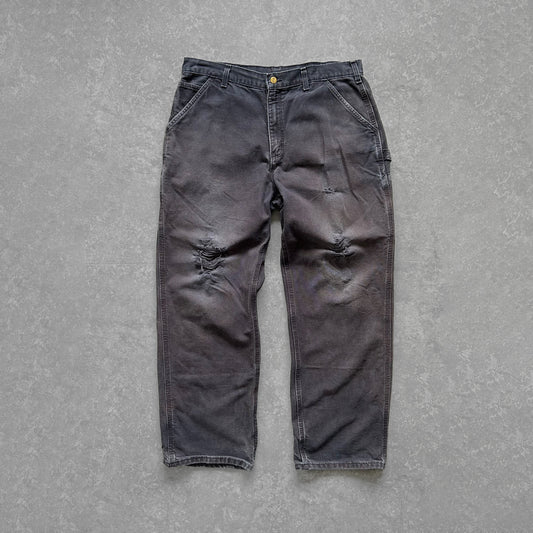 1990s - vintage faded navy worn carhartt single knee carpenter trousers
